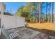 Small patio with two chairs and fenced yard at 493 Shellbank Dr. # 2-B, Longs, SC 29568