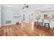 Kitchen features hardwood floors, granite counters, and white cabinets at 879 Waterton Ave., Myrtle Beach, SC 29579