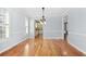 Spacious dining room with hardwood floors and view into kitchen at 879 Waterton Ave., Myrtle Beach, SC 29579