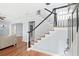 Elegant staircase with dark wood railings and white spindles at 879 Waterton Ave., Myrtle Beach, SC 29579