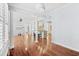 Open dining room with hardwood floors and kitchen access at 879 Waterton Ave., Myrtle Beach, SC 29579
