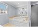 Bathroom with a luxurious soaking tub and a large mirror at 879 Waterton Ave., Myrtle Beach, SC 29579