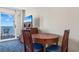 Ocean view condo with table for four and balcony access at 5200 N Ocean Blvd. # 1231, Myrtle Beach, SC 29577