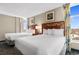 Condo bedroom with two double beds and ocean view at 5200 N Ocean Blvd. # 1231, Myrtle Beach, SC 29577
