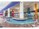 Large indoor pool with floats and play features at 5200 N Ocean Blvd. # 1231, Myrtle Beach, SC 29577