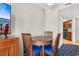 Small condo dining area with round table and four chairs at 5200 N Ocean Blvd. # 1231, Myrtle Beach, SC 29577