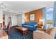 Condo living room with sofa, armchair, and view at 5200 N Ocean Blvd. # 1231, Myrtle Beach, SC 29577