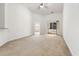 Spacious living room with carpeting, sliding glass doors to balcony at 111 Portsmith Dr. # 6, Myrtle Beach, SC 29588