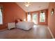 Spacious bedroom with a queen-size bed and access to a private patio at 172 Collins Glen Dr., Murrells Inlet, SC 29576