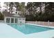 Community pool with a pool house and surrounding fence at 172 Collins Glen Dr., Murrells Inlet, SC 29576