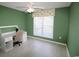 Bedroom with desk, ceiling fan and window coverings at 172 Collins Glen Dr., Murrells Inlet, SC 29576