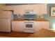 White kitchen cabinets, modern stove and microwave at 172 Collins Glen Dr., Murrells Inlet, SC 29576