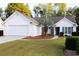 Charming one-story home with attached garage and landscaped lawn at 172 Collins Glen Dr., Murrells Inlet, SC 29576