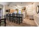 Kitchen with breakfast bar, light wood cabinets, and appliances at 4880 Dahlia Ct. # 305, Myrtle Beach, SC 29577