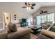 Living room with couches, coffee table, and access to balcony at 4880 Dahlia Ct. # 305, Myrtle Beach, SC 29577