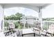Relaxing balcony with comfy chairs and view of the community at 4880 Dahlia Ct. # 305, Myrtle Beach, SC 29577