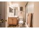 Simple bathroom with a shower, toilet, and wood vanity at 4880 Dahlia Ct. # 305, Myrtle Beach, SC 29577