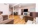 Open living room and dining area with hardwood floors at 114 N Pinewood Dr. N, Surfside Beach, SC 29575