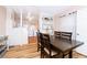 Dining area with wood table and chairs, open to the kitchen at 114 N Pinewood Dr. N, Surfside Beach, SC 29575