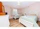 Guest bedroom with two twin beds and light decor at 114 N Pinewood Dr. N, Surfside Beach, SC 29575