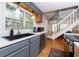 Modern kitchen with stainless steel appliances and white cabinets at 114 N Pinewood Dr. N, Surfside Beach, SC 29575