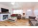 Living area with fireplace and comfortable seating at 114 N Pinewood Dr. N, Surfside Beach, SC 29575