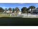 Community pool with surrounding lounge chairs at 4893 Magnolia Pointe Ln. # 103, Myrtle Beach, SC 29577