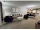 Spacious living room with contemporary furniture and neutral colors at 4893 Magnolia Pointe Ln. # 103, Myrtle Beach, SC 29577
