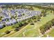Aerial view of community near golf course at 4893 Magnolia Pointe Ln. # 103, Myrtle Beach, SC 29577