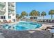 Inviting kidney-shaped pool with lounge chairs at 2700 N Ocean Blvd. # 1554, Myrtle Beach, SC 29577
