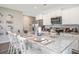 Modern kitchen with white cabinets, granite countertops, and stainless steel appliances at 651 Wallace Dr., Little River, SC 29566