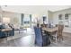 Bright living room features water views, comfy seating, and dining area at 651 Wallace Dr., Little River, SC 29566
