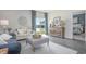 Open living room with water views and access to bedroom at 651 Wallace Dr., Little River, SC 29566
