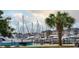 Stunning marina view with many boats and palm trees at 651 Wallace Dr., Little River, SC 29566
