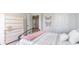 Well-lit bedroom with a dresser and comfortable bedding at 510 Firouz Dr, Longs, SC 29568