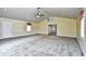 Large living room with gray carpet, vaulted ceilings and neutral walls at 4336 Summitt Trail, Myrtle Beach, SC 29579