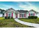 Ranch-style home with red shutters and a curved walkway at 4336 Summitt Trail, Myrtle Beach, SC 29579