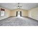 Large living room with gray carpet, vaulted ceilings and neutral walls at 4336 Summitt Trail, Myrtle Beach, SC 29579
