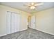 Bedroom with double doors and ceiling fan at 4336 Summitt Trail, Myrtle Beach, SC 29579