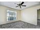 Well-lit bedroom with a large window and ceiling fan at 4336 Summitt Trail, Myrtle Beach, SC 29579