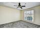 Bright bedroom featuring a large window and ceiling fan at 4336 Summitt Trail, Myrtle Beach, SC 29579
