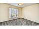 Bedroom with ceiling fan and large window at 4336 Summitt Trail, Myrtle Beach, SC 29579