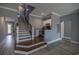 Elegant staircase with wooden steps and wrought iron railing at 845 Waterton Ave., Myrtle Beach, SC 29579