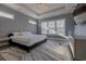 Bright main bedroom with a king-size bed and large windows at 845 Waterton Ave., Myrtle Beach, SC 29579