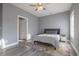 Bright bedroom with a queen-size bed and wood floors at 845 Waterton Ave., Myrtle Beach, SC 29579