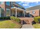 Brick patio with seating area, covered pergola, and a built-in TV at 3754 Annandale Dr., Myrtle Beach, SC 29577