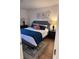 Comfortable bedroom with king-size bed and decor at 410 Melrose Pl. # 305, Myrtle Beach, SC 29572