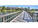 Peaceful lakeside boardwalk offering scenic views at 410 Melrose Pl. # 305, Myrtle Beach, SC 29572