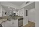 Kitchen with granite countertops and stainless steel dishwasher at 410 Melrose Pl. # 305, Myrtle Beach, SC 29572