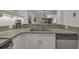 Kitchen with granite countertops and double sink at 410 Melrose Pl. # 305, Myrtle Beach, SC 29572